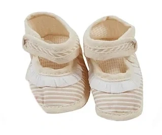 Kojenecké capáčky s kanýrkem krémové