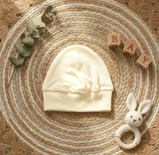 Kojenecká bavlněná čepička Hříbek krém